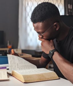 boy reading bible