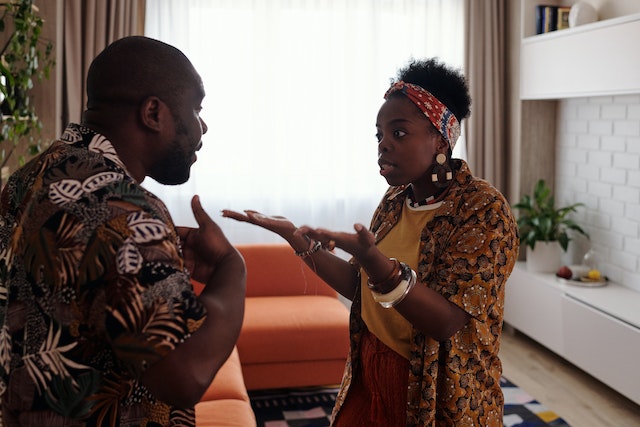 couple arguing with tense body language